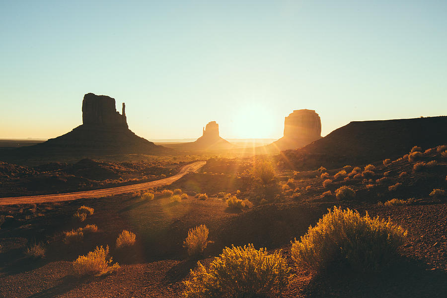 Monument Valley at sunrise, Arizona, USA Photograph by Bluejayphoto