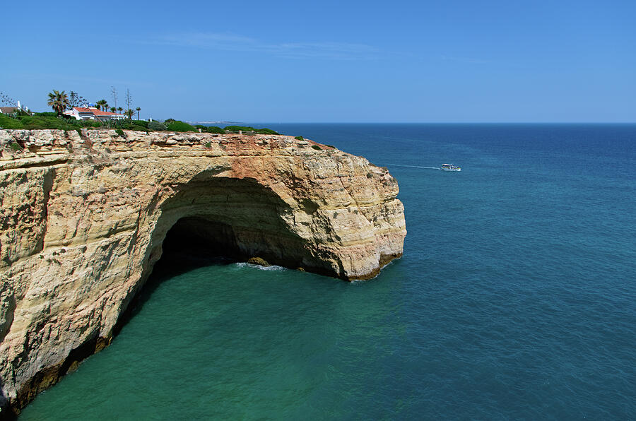 Monumental cliff formation in Lagoa Photograph by Angelo DeVal