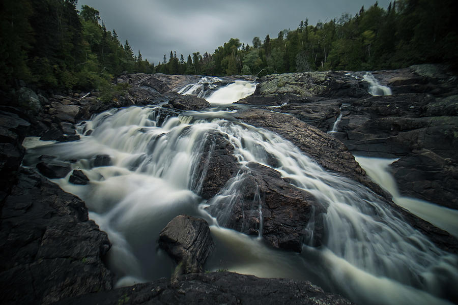 A moody and dreary vibe at Sand River Falls Photograph by Jay Smith