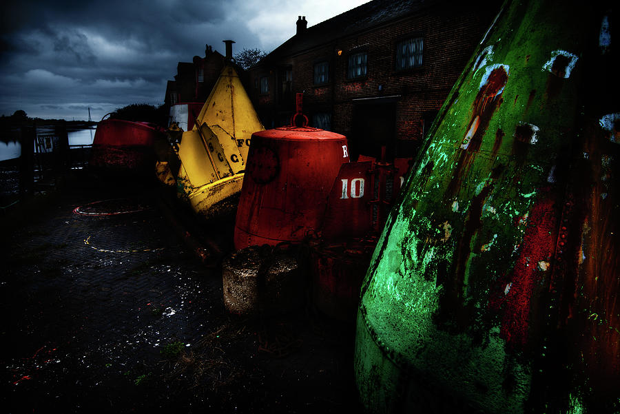 Moody Buoys Ready to Float Photograph by Dennis Dame