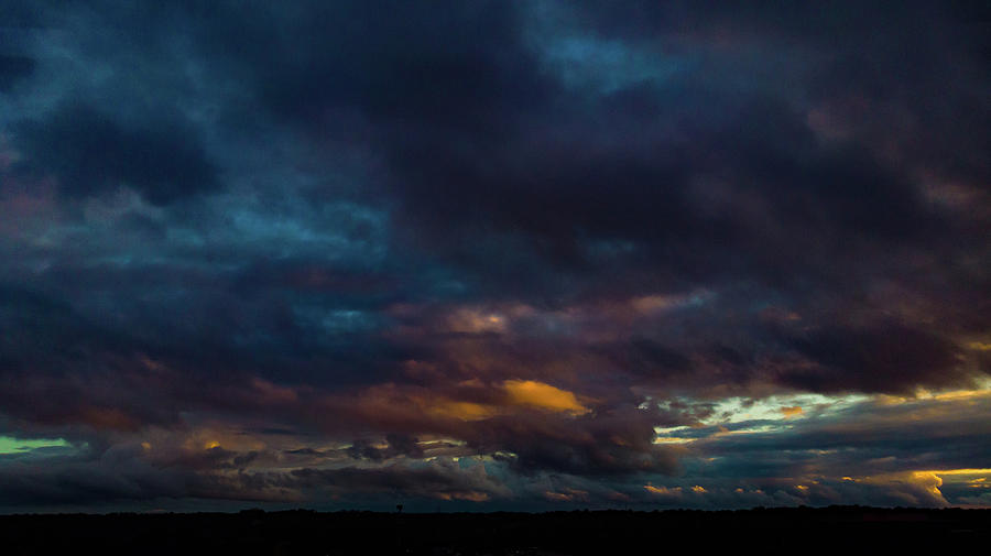 Moody Clouds Photograph by Mike Dunn - Fine Art America