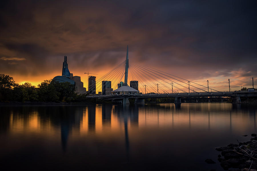 Moody skies clouding over the Winnipeg skyline Photograph by Jay Smith