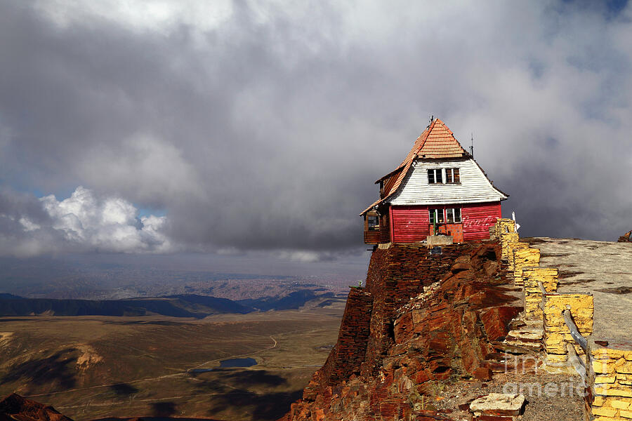 Moody skies over the Old Ski Hut Chacaltaya Bolivia Photograph by James Brunker
