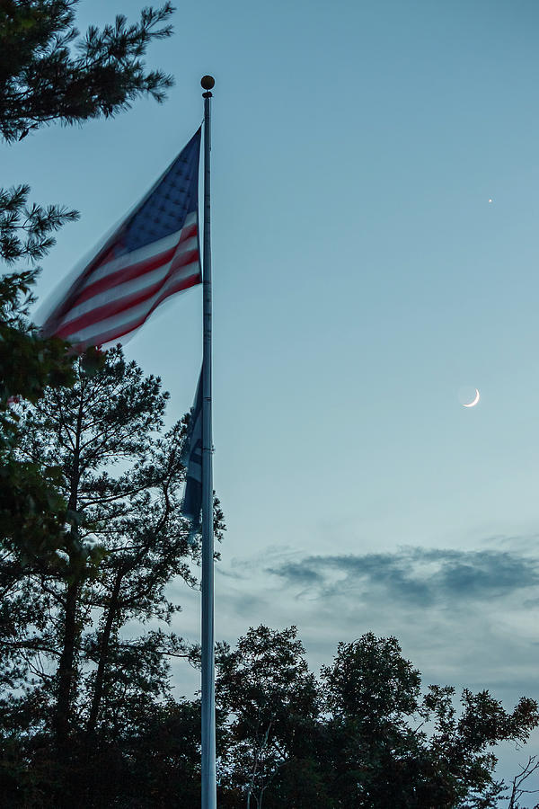 Moon and Venus with Flag Photograph by Greg Booher