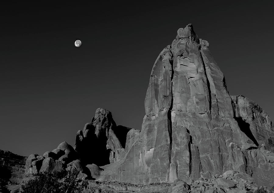 Moon Over Arches Spire Monochrome Photograph by Wayne King