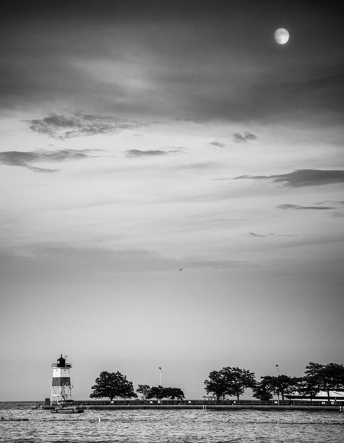 Moon Over Guidewall Lighthouse In Black and White Photograph by Greg and Chrystal Mimbs