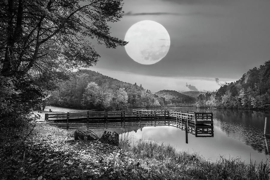 Moon Rising over the Lake Black and White Photograph by Debra and Dave Vanderlaan