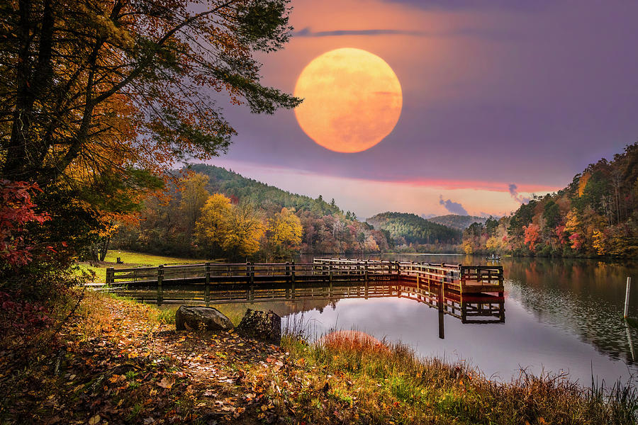 Moon Rising over the Lake Photograph by Debra and Dave Vanderlaan