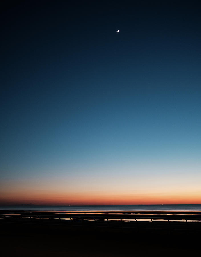 Sunset Photograph - Moon sky and low tide by Nick Barkworth