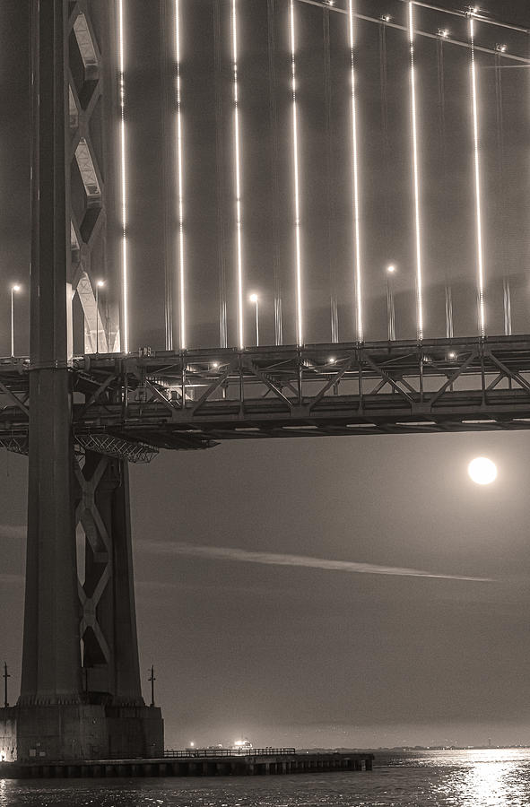 Moon Under Bridge  Sepia Photograph by Jonathan Nguyen