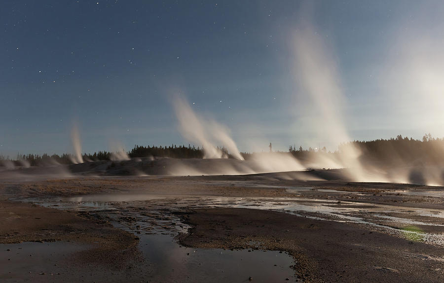 Moonlit Geysers in Yellowstone Photograph by Cliff Wassmann