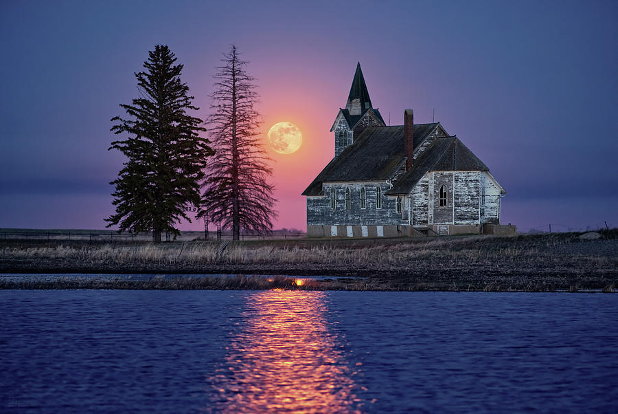 Moonrise at the Big Coulee - Abandoned rural ND church with lake and full moon rising Photograph by Peter Herman