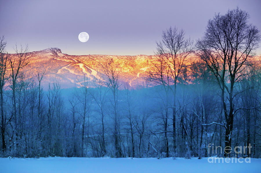 Moonrise over Mt. Mansfield in Stowe Vermont. Photograph by Don Landwehrle