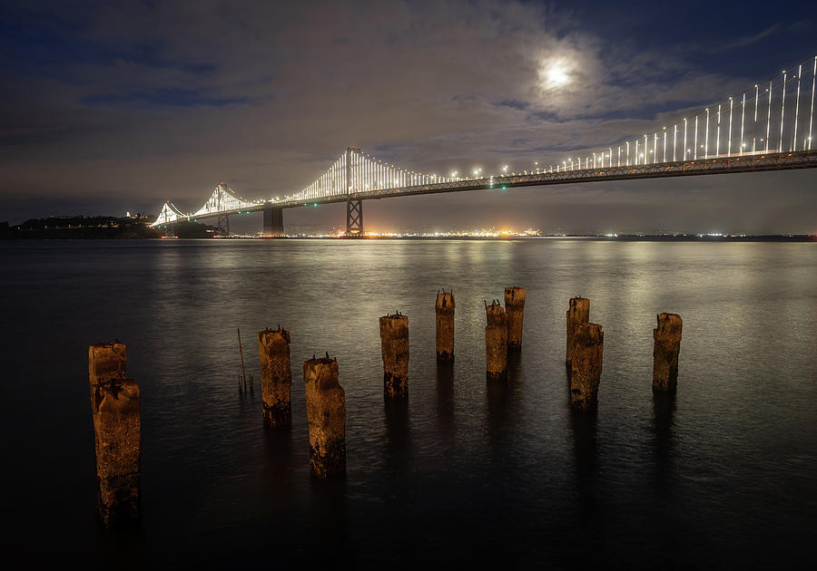 Moonrise over Oakland Bay Bridge in San Francisco Photograph by Kyle Lee