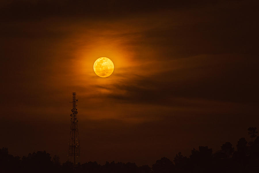 Moonrise over telecommunication tower Photograph by Shaifulzamri
