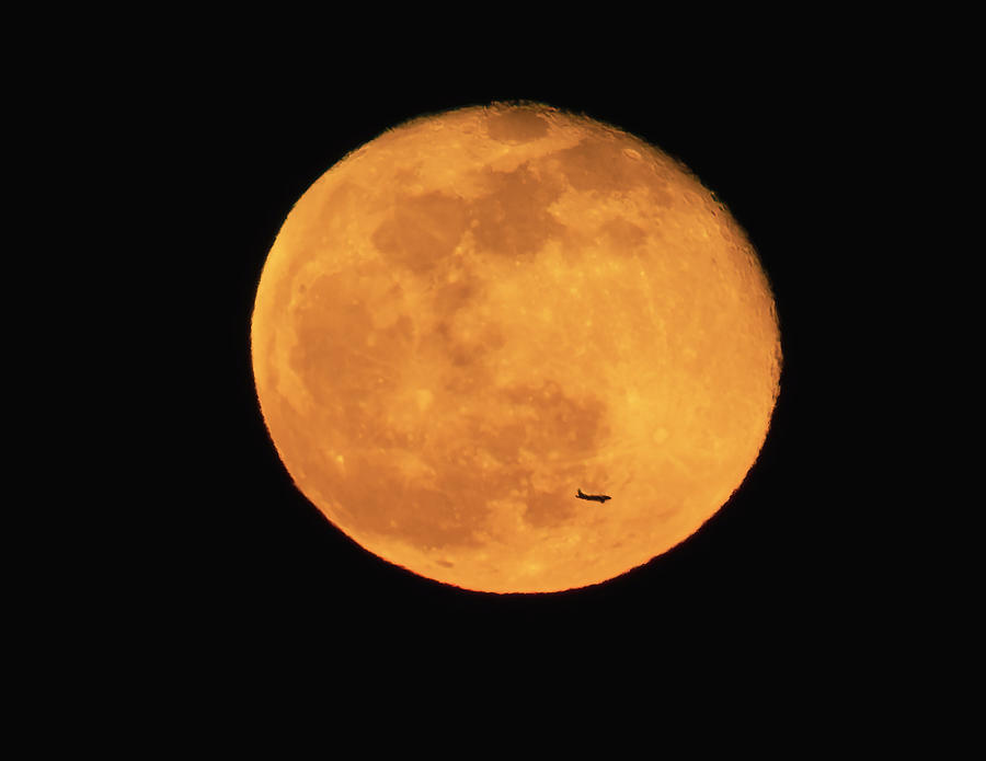 Moonrise With Plane Photograph