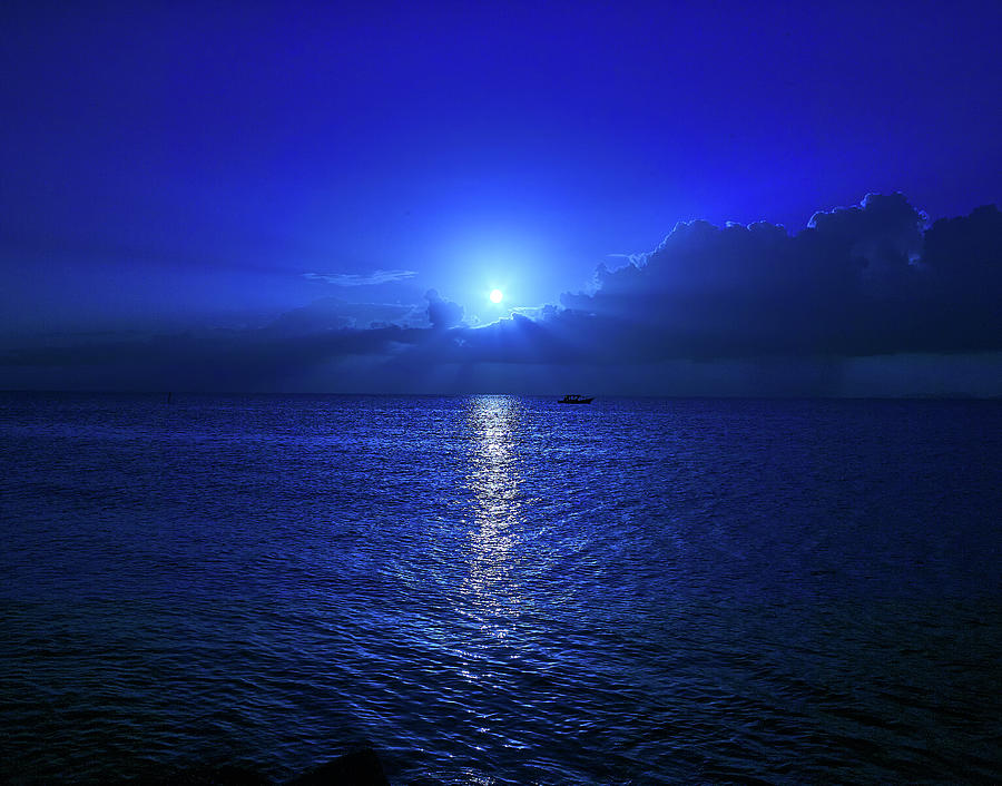 Moonset over the ocean by Trinidad Dreamscape Moonset over the ocean by Trinidad Dreamscape