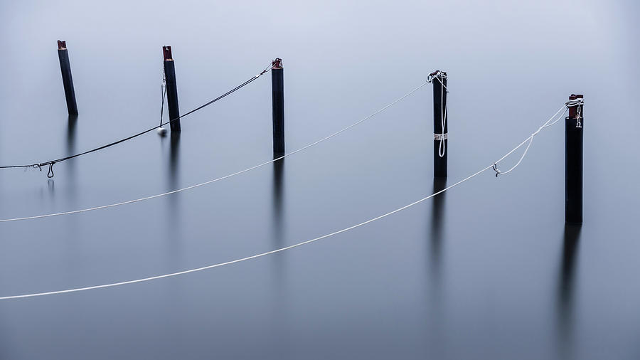 Nature Photograph - Mooring Poles by Nicklas Gustafsson