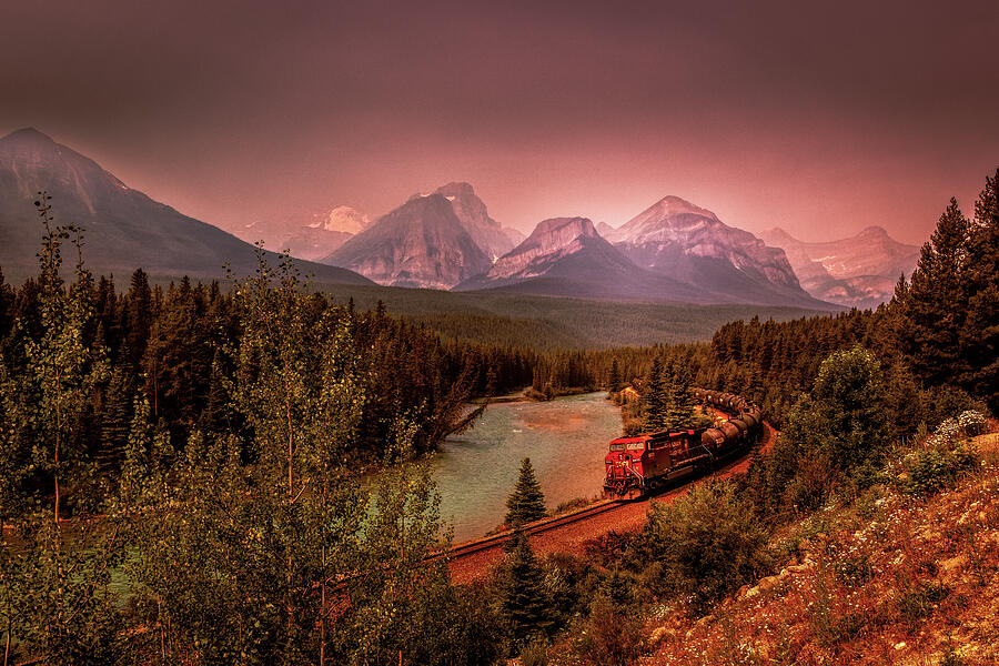 Banff National Park Photograph - Morants Curve Train at Sunset by Norma Brandsberg