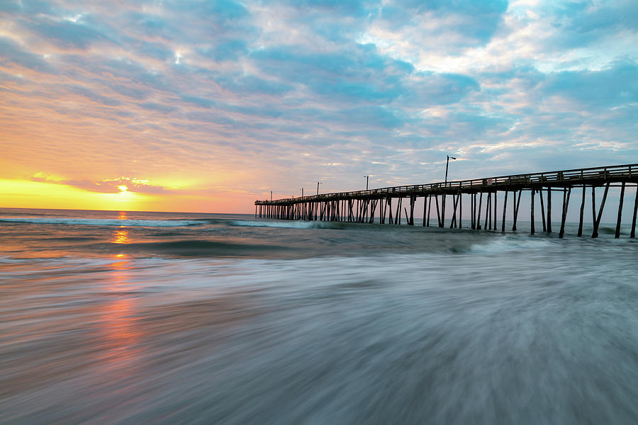 Nags Head Photograph - Morning Embrace - A Timeless Dance at Nags Head Pier by Gregory Ballos