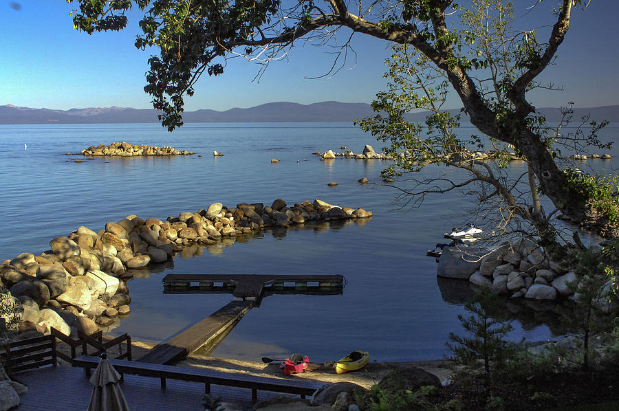 Morning Glow and Kayaks on Lake Tahoe Photograph by Bonnie Colgan