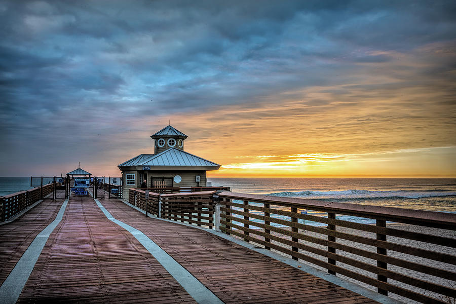 Morning Light at the Juno Beach Pier Photograph by Debra and Dave Vanderlaan