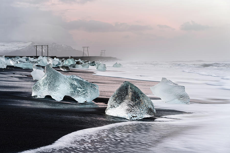 Ice Photograph - Morning light on the black ice beach by Ralf Lehmann