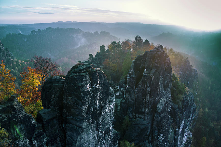 Morning mist on the Bastei rocks in Saxon Switzerland Photograph by Sun Travels
