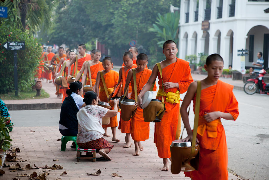 Morning monk procession in Luang Prabang, Laos Photograph by Fototrav