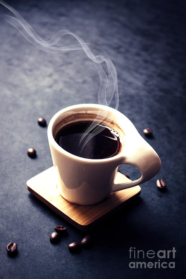 Morning small cup of coffee or espresso drink with steam aroma r