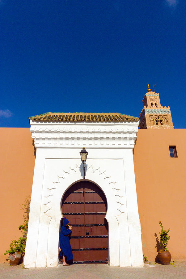 Moroccan playing flute, Koutoubia, Marrakech Photograph by Nico Tondini