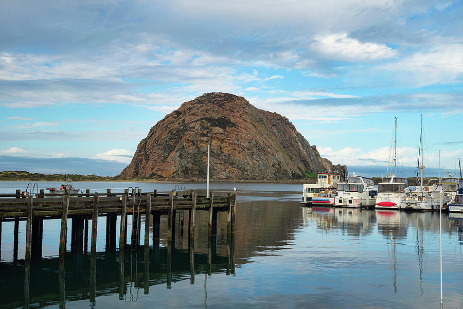 Morro Rock Reflection with Pier and Boats Photograph by Matthew DeGrushe