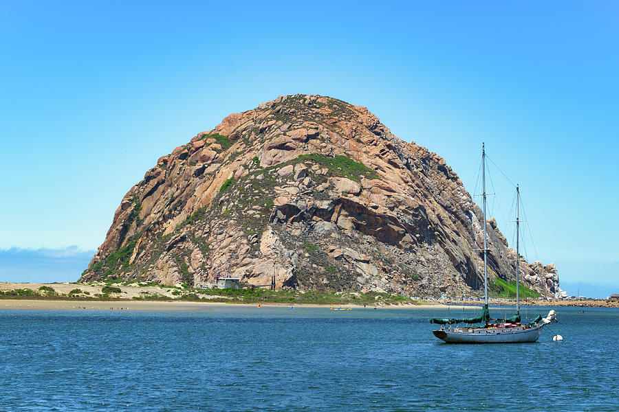 Morro Rock with Sailboat Photograph by Matthew DeGrushe
