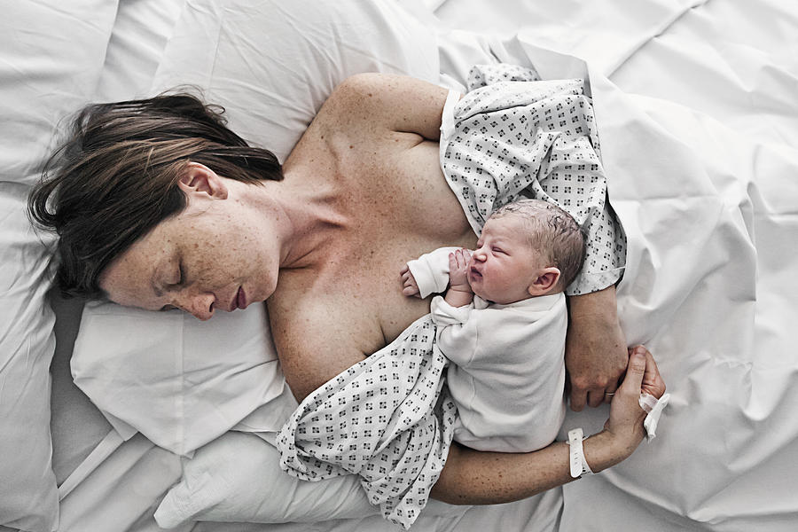 Mother and Baby (0-1 months) Minutes after Giving Birth Photograph by Justin Paget
