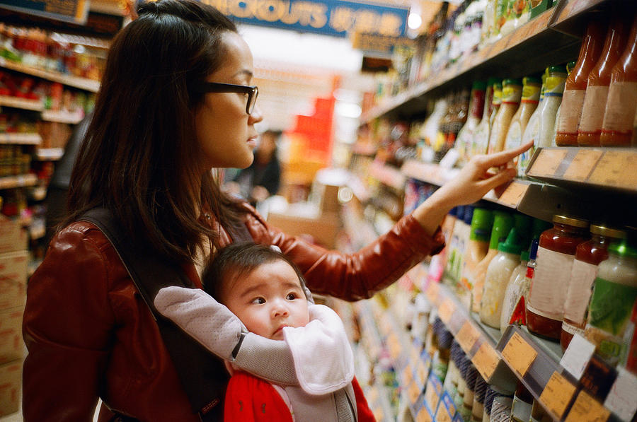 Mother and baby boy at supermarket Photograph by images by Tang Ming Tung