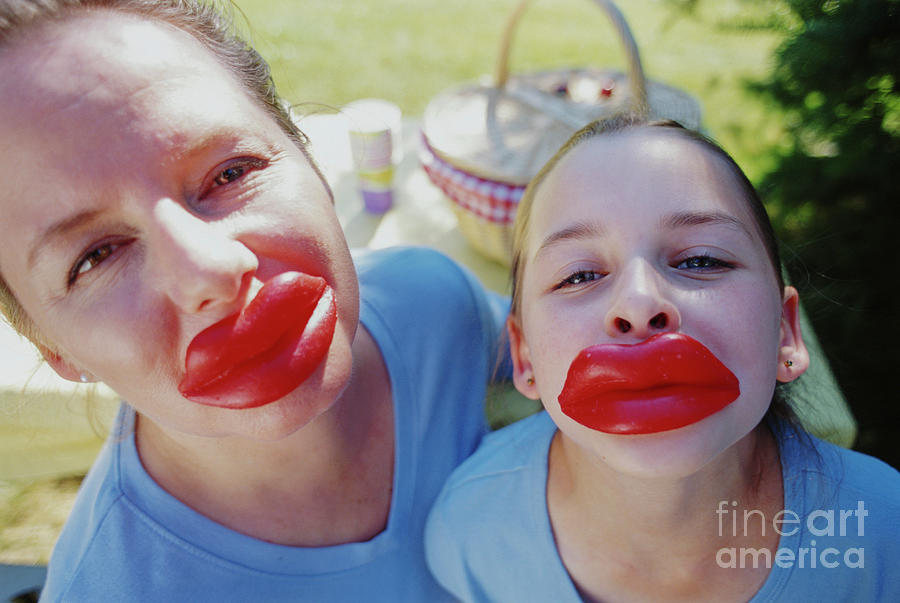 Mother And Daughter Portrait With Wax Lips Photograph by Jim Corwin