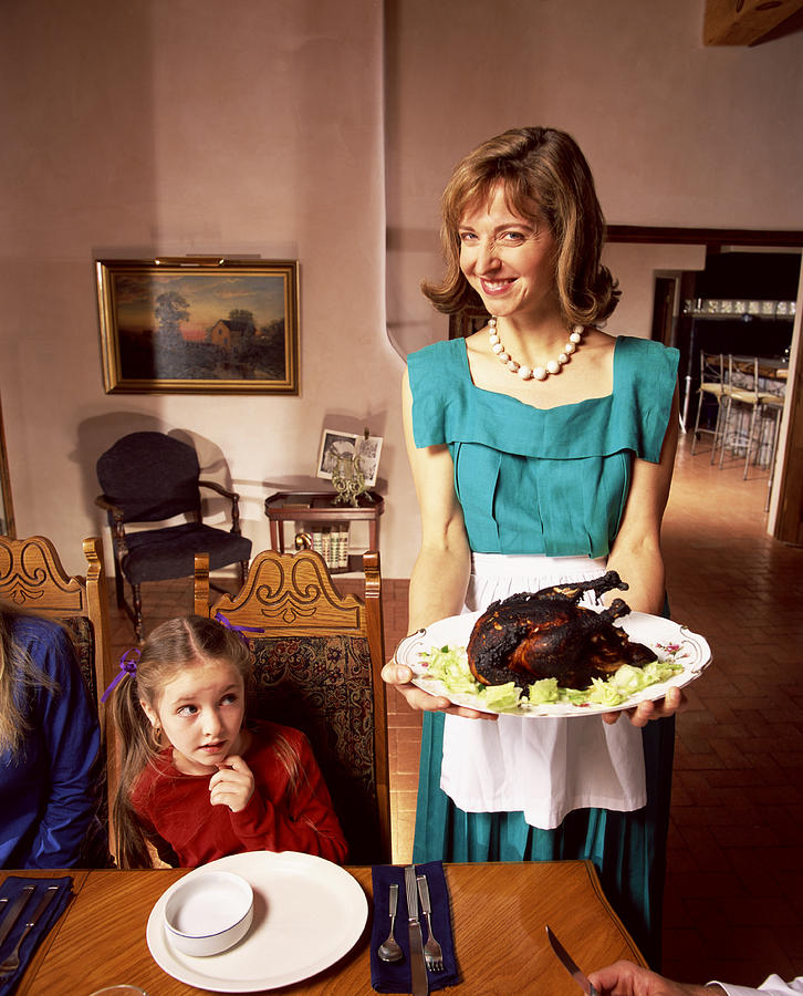 Mother and daughter with burnt chicken Photograph by Chip Simons