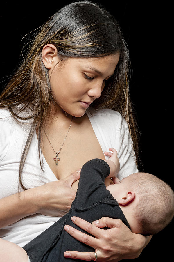 Mother Breastfeeding Baby Photograph by TomFullum