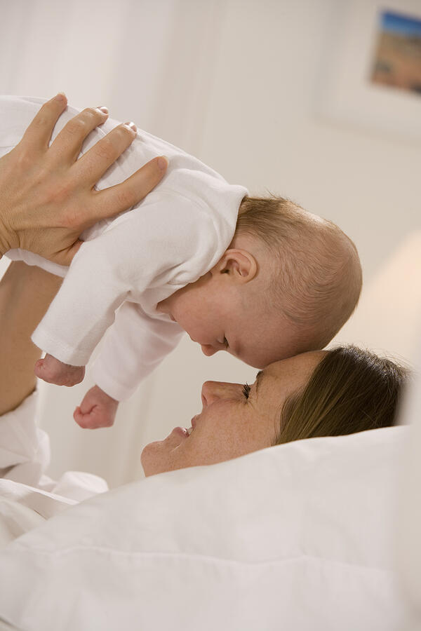 Mother holding baby face to face Photograph by Comstock Images