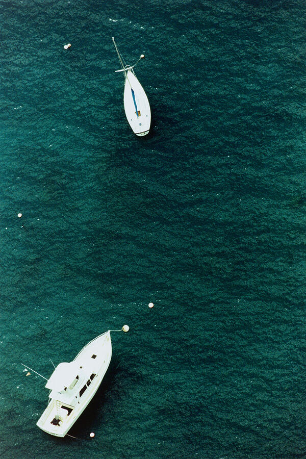 Motor boats on ocean, aerial view, Hawaii, USA Photograph by Dex Image