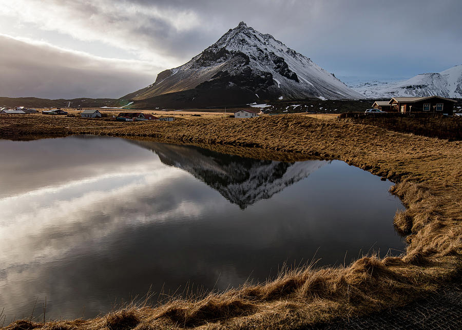 Mountain landscape at and hilltop reflection at a lake. Photograph by Michalakis Ppalis