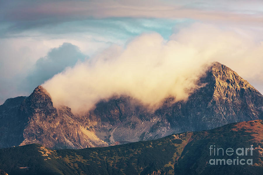 Mountain peaks in clouds at sunset. Tatra Mountains, Poland Photograph by Michal Bednarek
