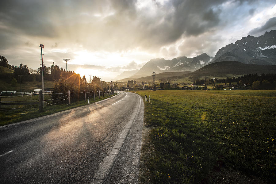 Mountain road at sunset Photograph by Christian Adams