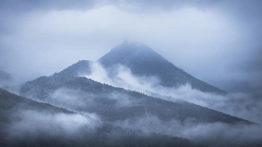 Mountain shrouded by fog and clouds from Slovakia, Europe Photograph by Peter Kolejak