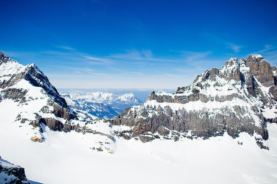 Mountain Swiss Alps tops covered in snow Photograph by FamVeld