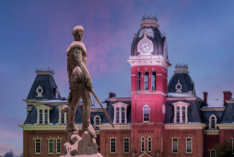 Mountaineer statue against Woodburn Hall tower Photograph by Steven Heap