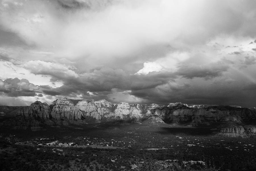 Mountains against storm clouds Photograph by Eunice Diaz / FOAP