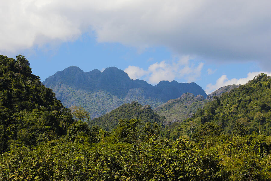Mountains in Vang Vieng Photograph by Thaslam