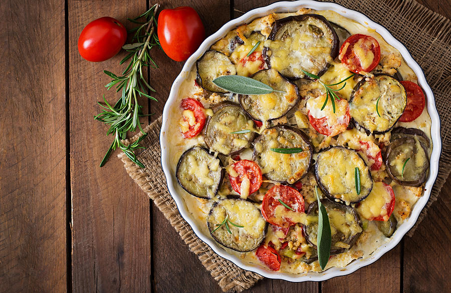 Moussaka (eggplant casserole) - a traditional Greek dish Photograph by Elena_Danileiko