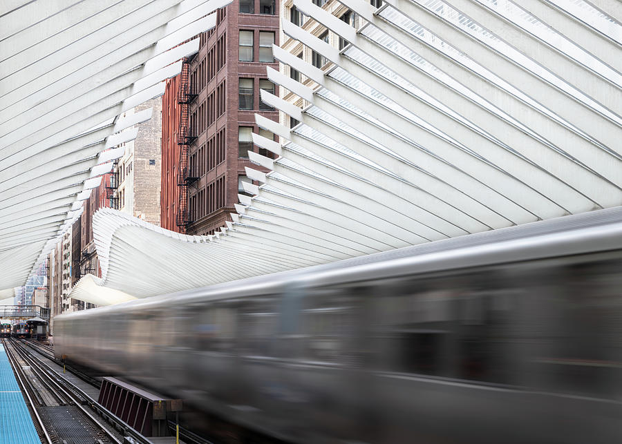 Moving Train At Washington/Wabash Station In Chicago Photograph by Elvira Peretsman